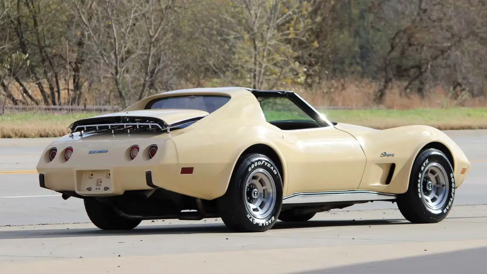 Click to Enlarge-Esc to Close Corvette Generations/C3/C3 1976 Tan Coupe Rear Three qtr.webp